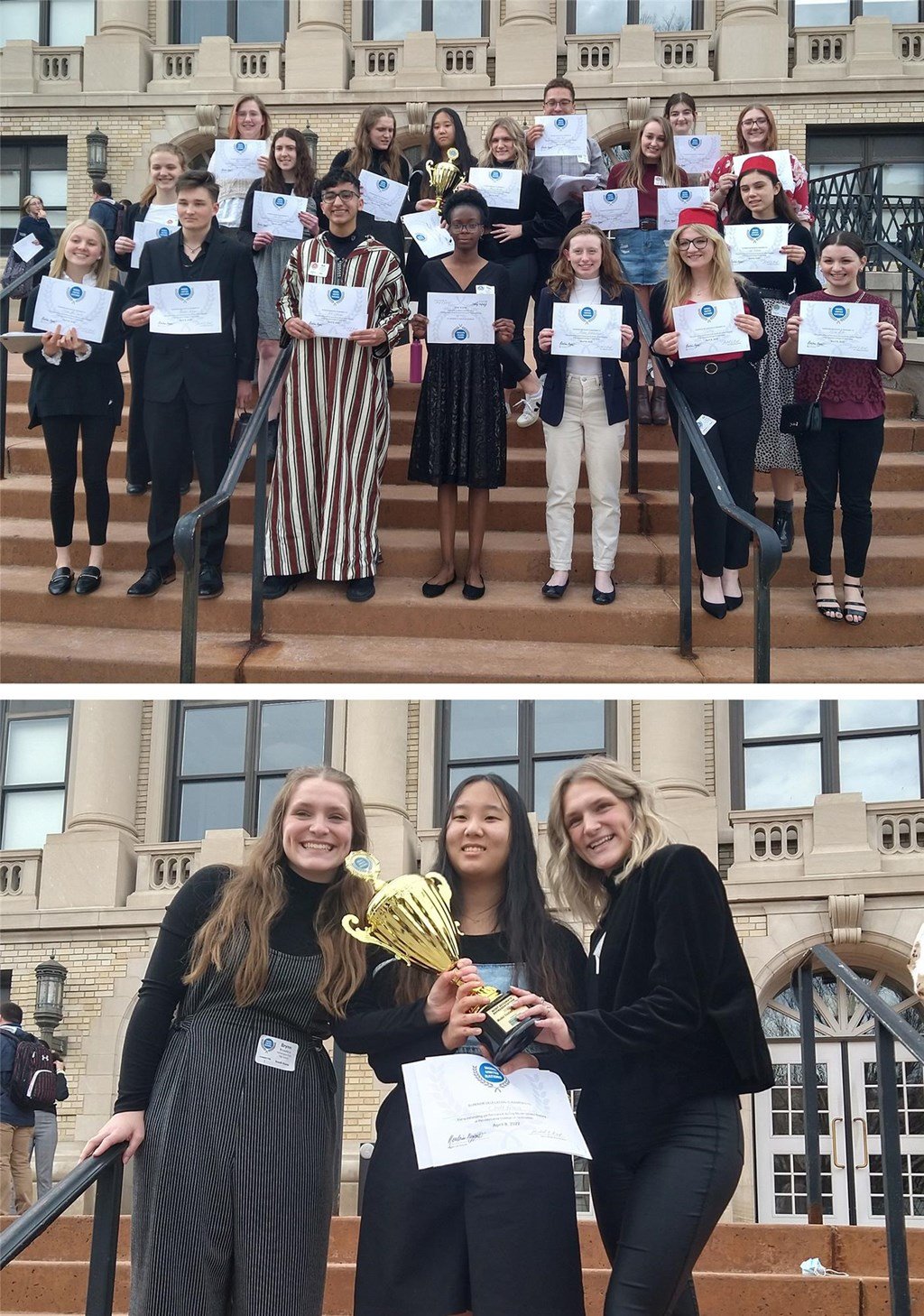 2022 Model UN students from WAHS stand holding certificates and trophies.