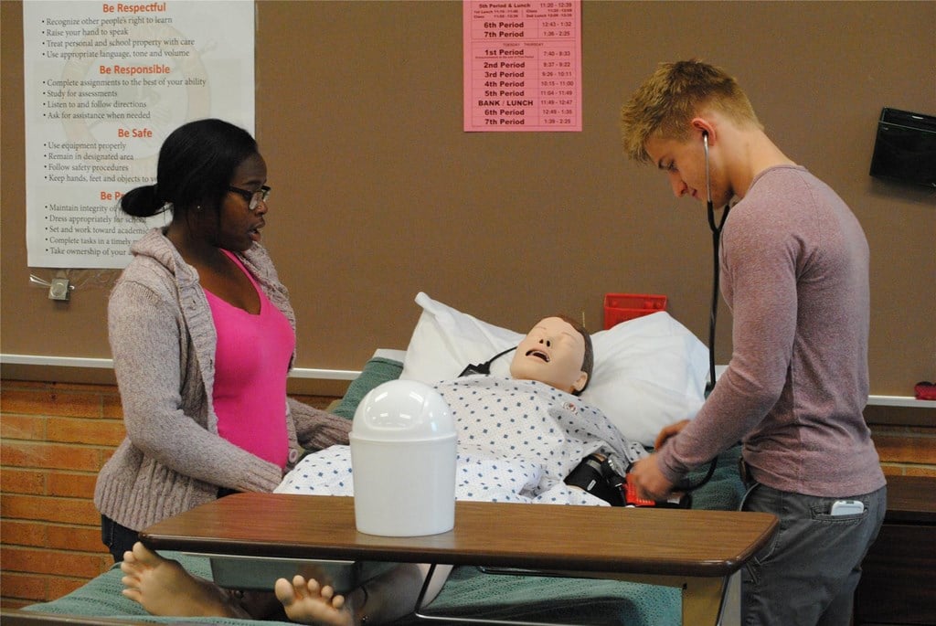 Health occupations students work on 